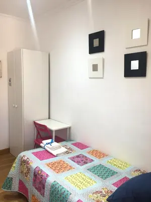 Cama o camas de una habitación en Alojamiento Jaén