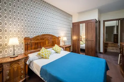 Cama o camas de una habitación en El Jardín del Ángel Tribulete