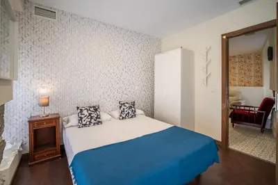Cama o camas de una habitación en El Jardín del Ángel Tribulete