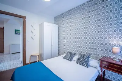 Cama o camas de una habitación en El Jardín del Ángel Tribulete