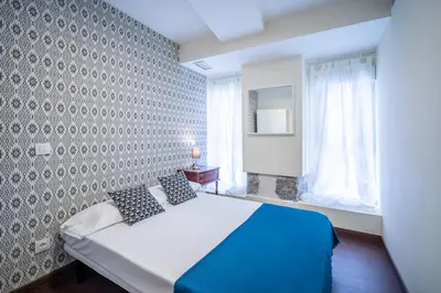 Cama o camas de una habitación en El Jardín del Ángel Tribulete