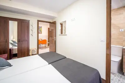 Cama o camas de una habitación en El Jardín del Ángel Tribulete