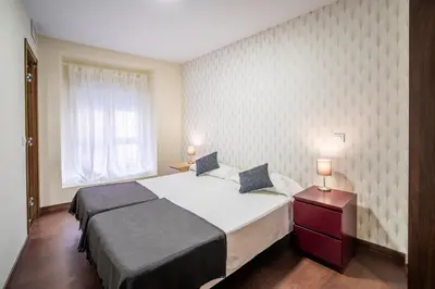 Cama o camas de una habitación en El Jardín del Ángel Tribulete