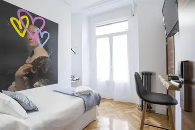 Cama o camas de una habitación en Hispano Boutique Gran Vía