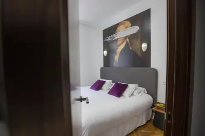 Cama o camas de una habitación en Hispano Boutique Gran Vía