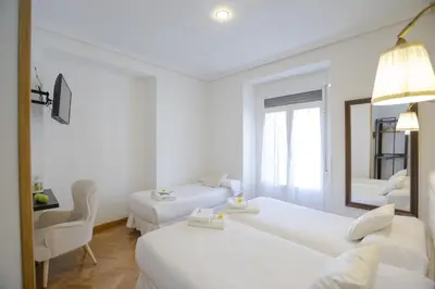 Cama o camas de una habitación en Hispano Boutique Gran Vía