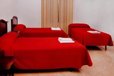 Cama o camas de una habitación en Hostal Condestable