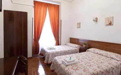 Cama o camas de una habitación en Hostal Condestable