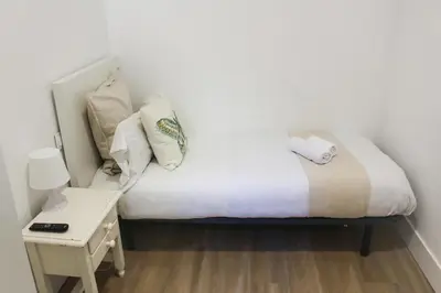 Cama o camas de una habitación en Pensión Estrella