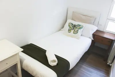 Cama o camas de una habitación en Pensión Estrella
