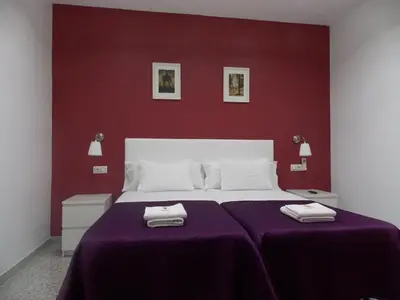 Cama o camas de una habitación en Pensión Corbero