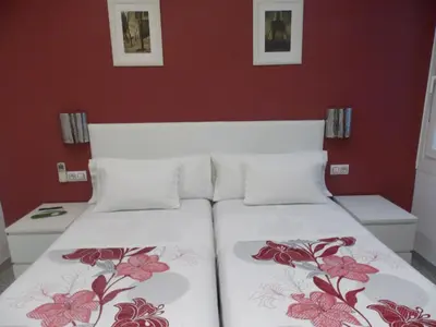 Cama o camas de una habitación en Pensión Corbero