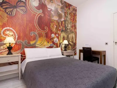 Cama o camas de una habitación en Pension Foster