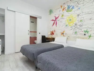 Cama o camas de una habitación en Pension Foster