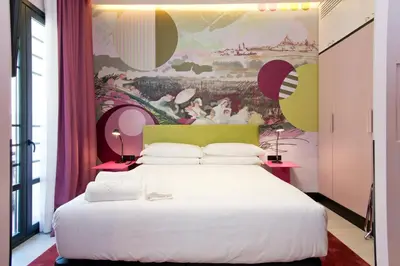 Cama o camas de una habitación en AmazINN Collection Madrid Amor de Dios