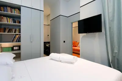 Cama o camas de una habitación en AmazINN Collection Madrid Amor de Dios