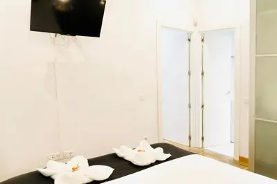 Cama o camas de una habitación en Gran Via MidStay