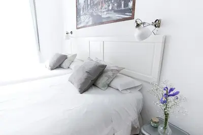 Cama o camas de una habitación en Vázquez de Mella Boutique Gran Vía