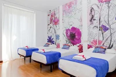 Cama o camas de una habitación en Vázquez de Mella Boutique Gran Vía