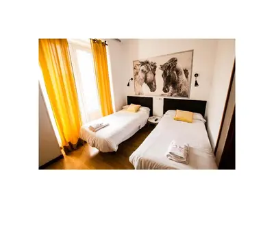 Cama o camas de una habitación en Vázquez de Mella Boutique Gran Vía