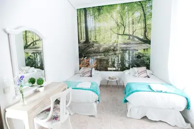 Cama o camas de una habitación en Vázquez de Mella Boutique Gran Vía