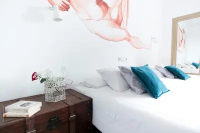 Cama o camas de una habitación en Vázquez de Mella Boutique Gran Vía