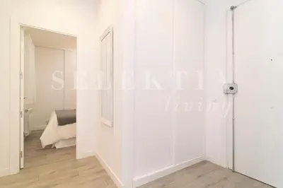 Cama o camas de una habitación en Castellana Suites