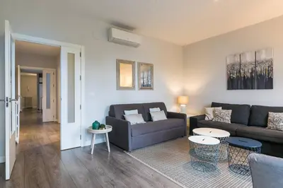 Zona de estar de Castellana Suites