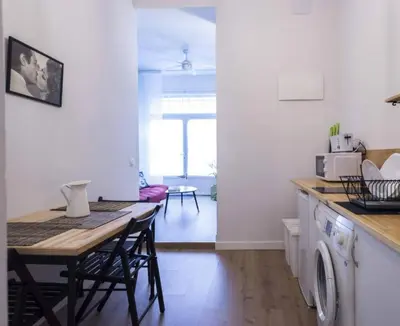 Una cocina o zona de cocina en MEZZANINe GREEN