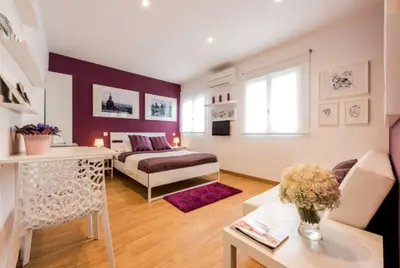 Cama o camas de una habitación en Apartamento en Calle Jardines - Madrid Centro
