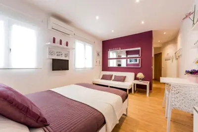 Cama o camas de una habitación en Apartamento en Calle Jardines - Madrid Centro