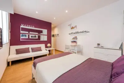 Cama o camas de una habitación en Apartamento en Calle Jardines - Madrid Centro