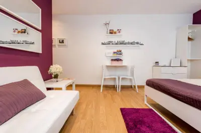Cama o camas de una habitación en Apartamento en Calle Jardines - Madrid Centro