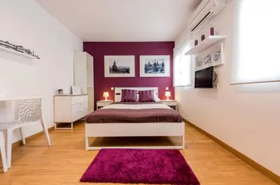 Cama o camas de una habitación en Apartamento en Calle Jardines - Madrid Centro