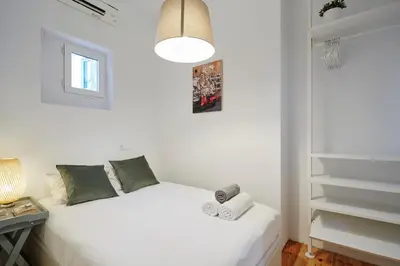 Cama o camas de una habitación en LEEWAYS APARTMENT in MANCEBOS