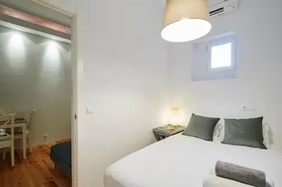 Cama o camas de una habitación en LEEWAYS APARTMENT in MANCEBOS