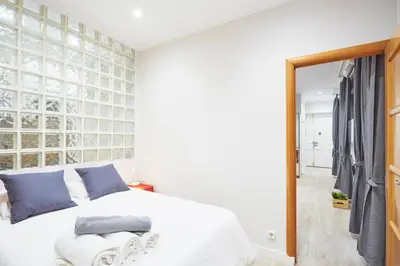 Cama o camas de una habitación en LEEWAYS APARTMENT in ROSARIO
