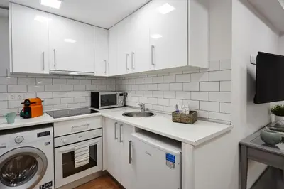 Una cocina o zona de cocina en LEEWAYS APARTMENT in SAN LORENZO