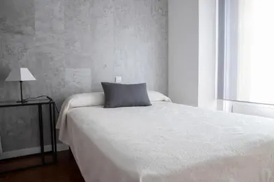 Cama o camas de una habitación en Hostal Tokio