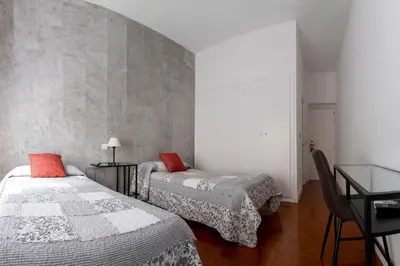 Cama o camas de una habitación en Hostal Tokio