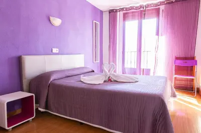 Cama o camas de una habitación en Hostal Rober