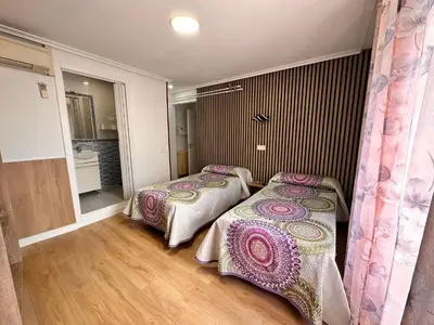 Cama o camas de una habitación en Hostal Rober
