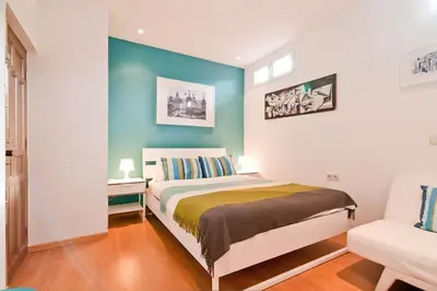 Cama o camas de una habitación en Ático en el Centro de Madrid - Calle Jardines