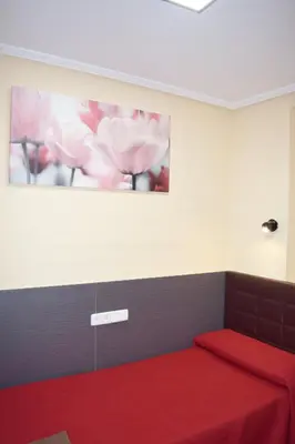 Cama o camas de una habitación en Hostal Numancia