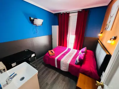 Cama o camas de una habitación en Hostal Numancia