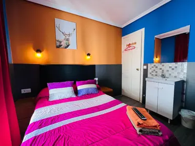Cama o camas de una habitación en Hostal Numancia
