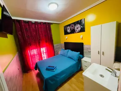 Cama o camas de una habitación en Hostal Numancia