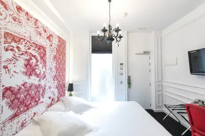 Cama o camas de una habitación en Posada del Dragón Boutique Hotel