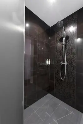 Un baño de Posada del Dragón Boutique Hotel