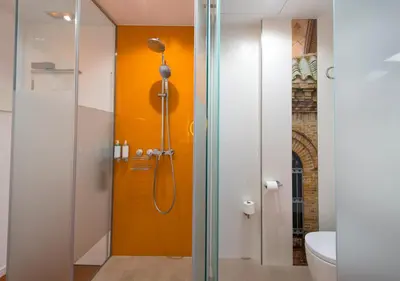 Un baño de Posada del Dragón Boutique Hotel